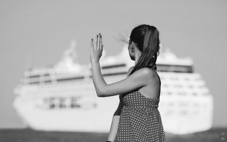 woman-waving-to-ship (1)